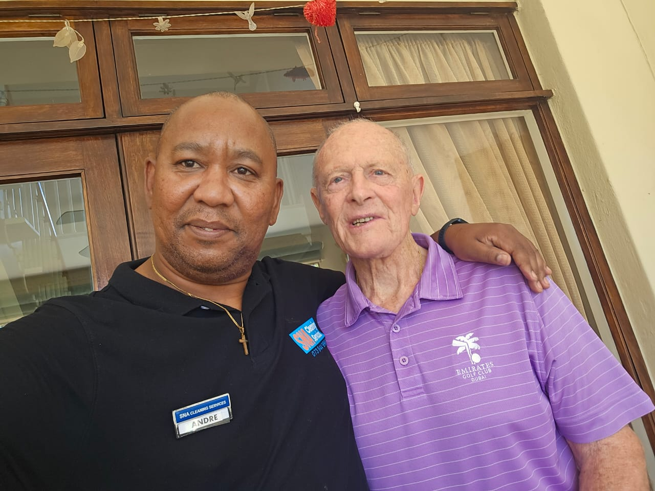 Andre Muller with a long-standing SNA Cleaning Services client