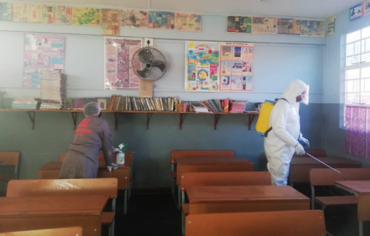 SNA team sanitising a school classroom